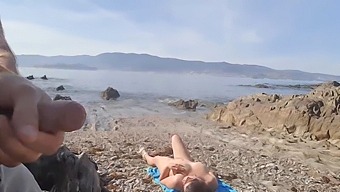 A European Couple Engages In Public Sex On The Beach With A Nudist Milf